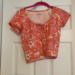 Pink floral baby tee. Hollister. Never worn
